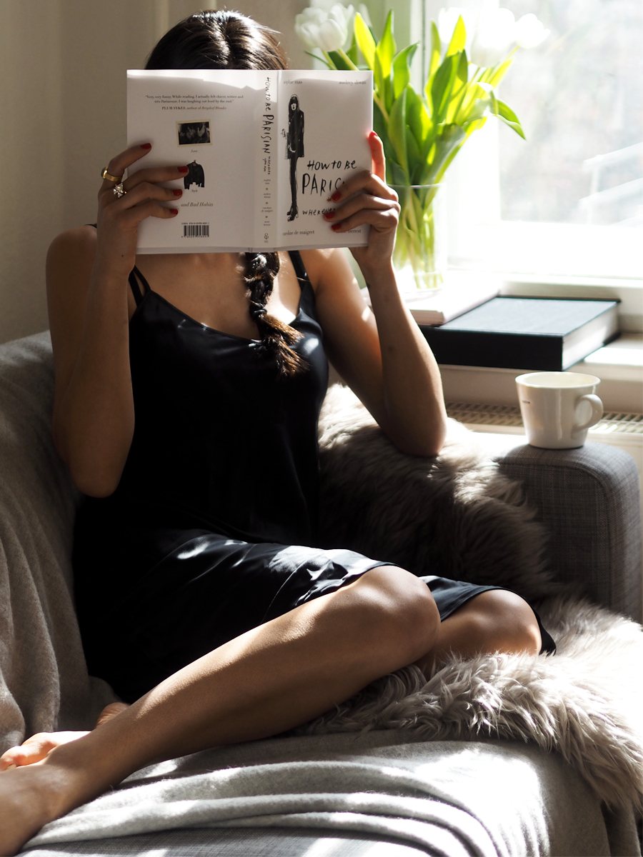 Not Your Standard blogger kayla seah reading how to be parisian book