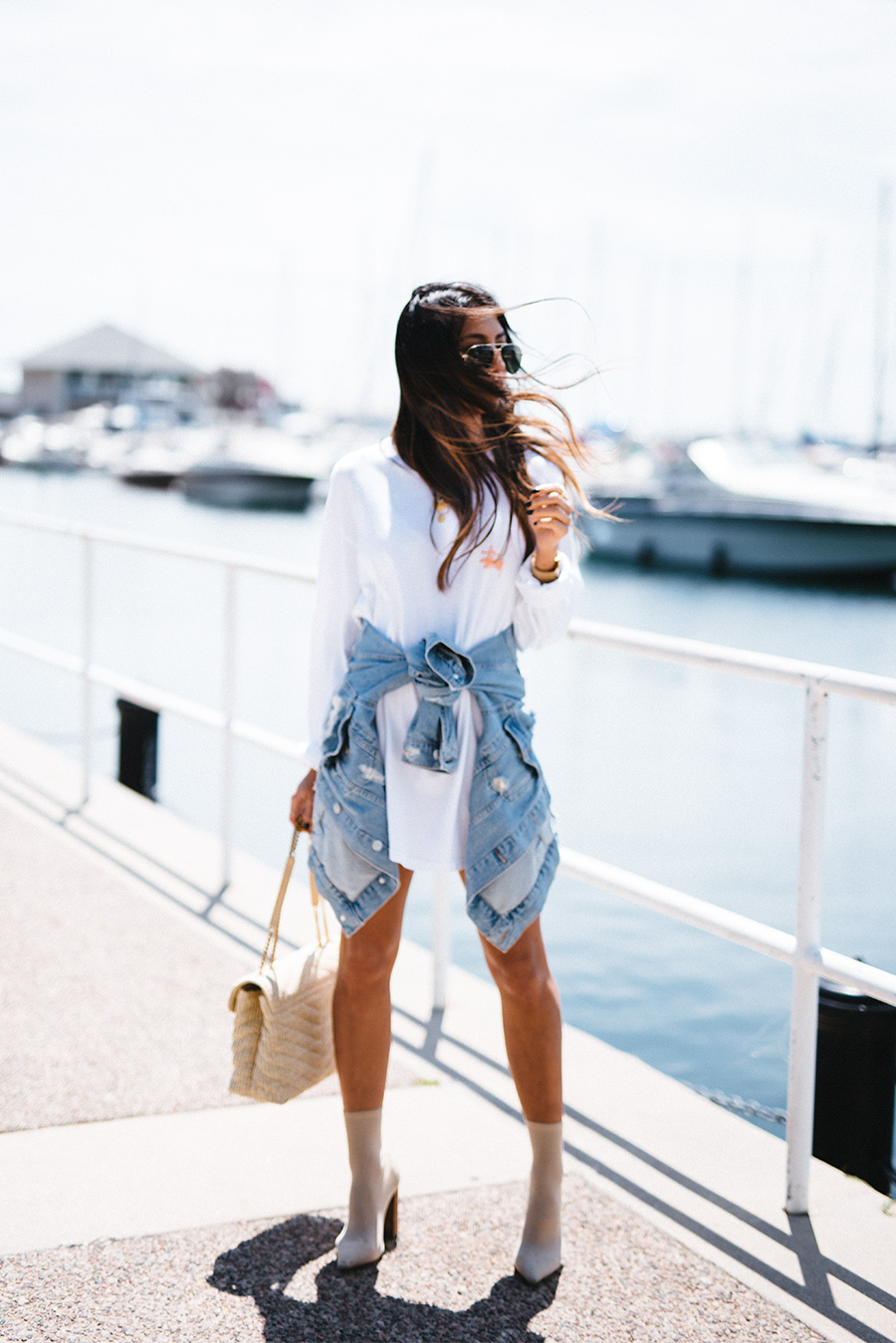 Not Your Standard fashion blogger Kayla Seah shows you how to wear the oversized long sleeve shirt dress with tony bianco diddy boots and saint laurent raffia bag