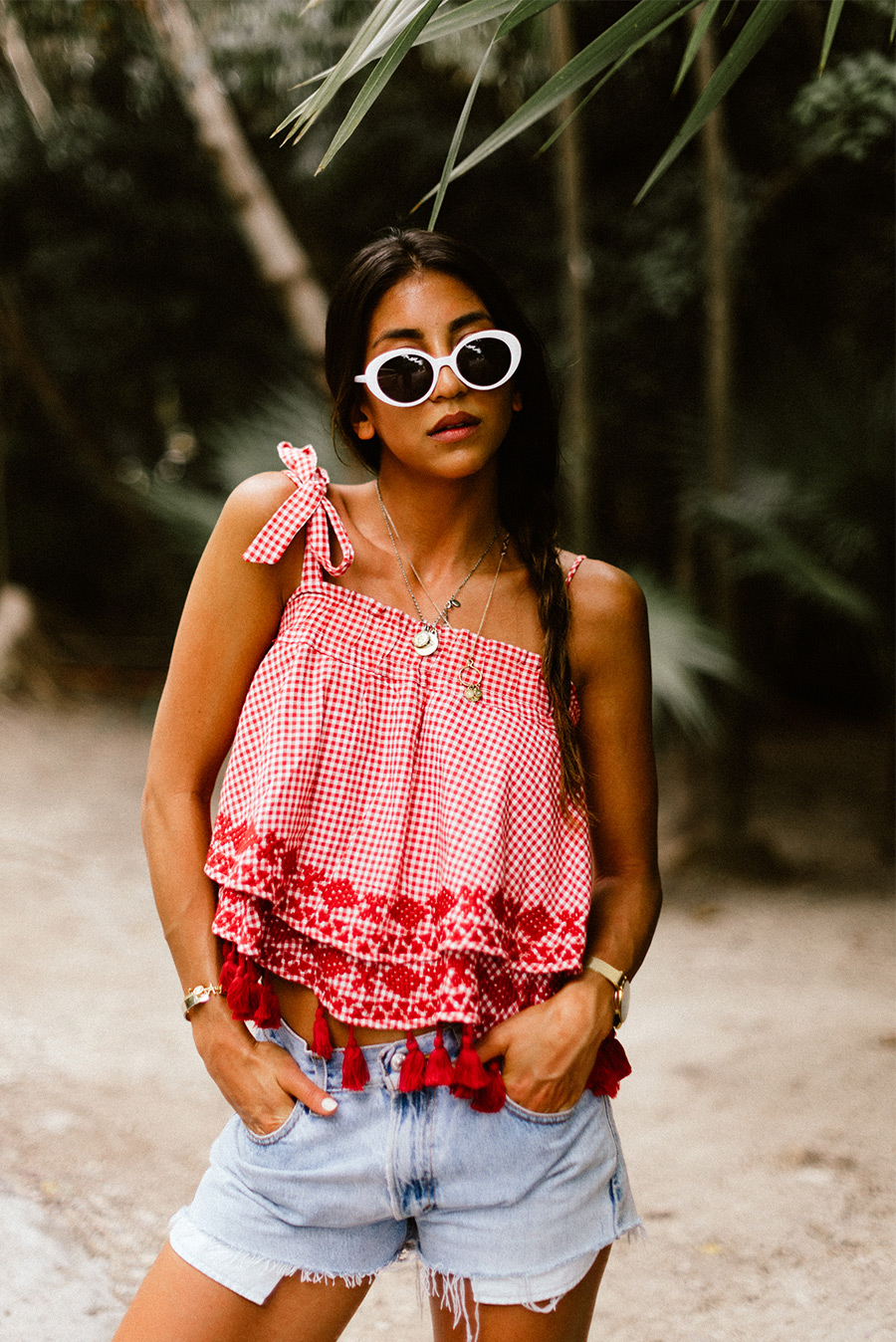 red gingham free people top vintage levi shorts beach girl model blogger beach hair beach waves white sunglasses tulum not your standard travel blog blogger fashion style outfit shop