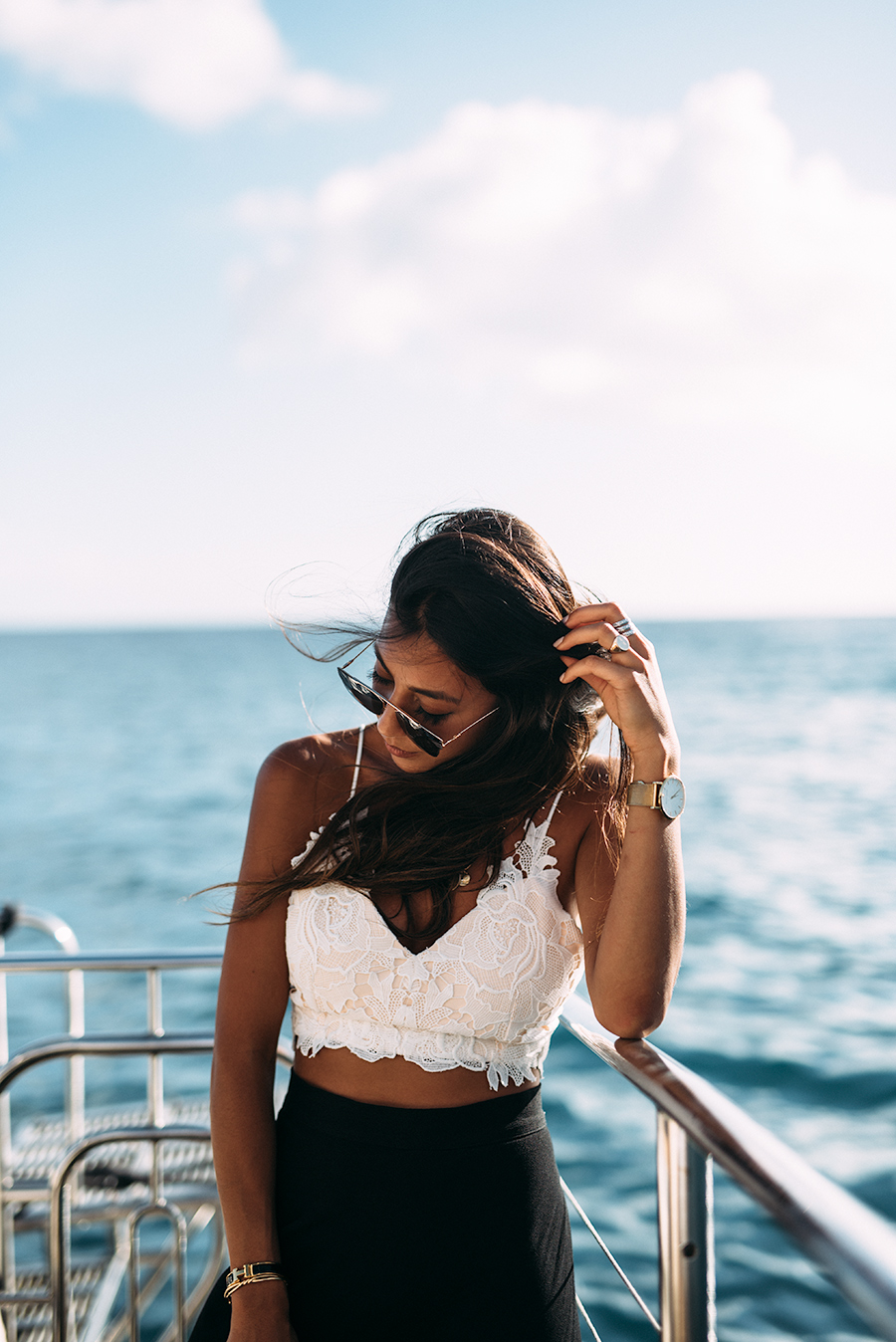 na pali coast boat ride kauai catamaran hawaii boat tour blogger blog travel guide not your standard kayla seah sunset golden hour armani beauty model girl style fashion inspiration
