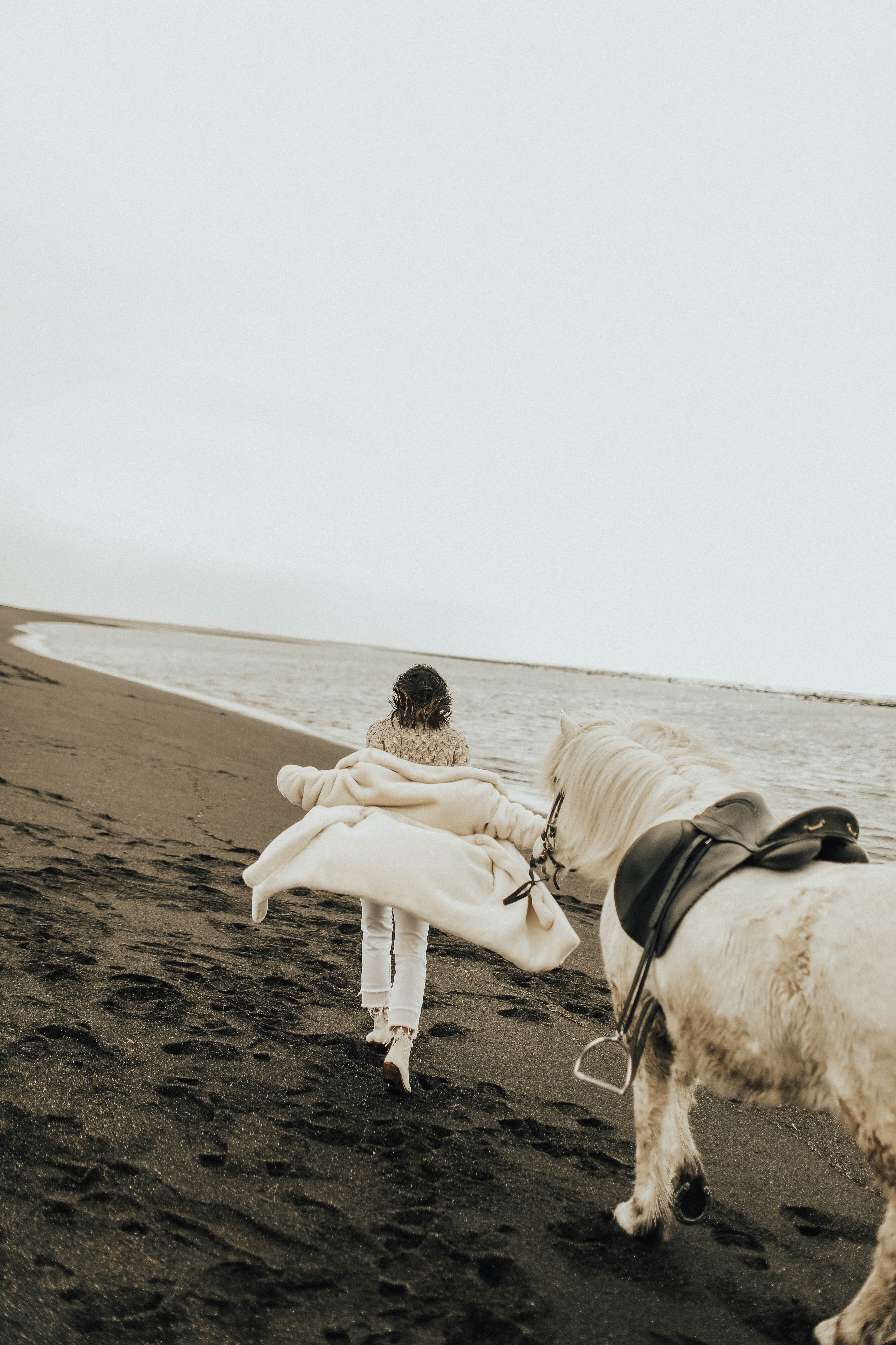 iceland trip narciso rodiquez pure musc the retreat blue lagoon black sand beach travel guide blogger blog pony white horse riding kayla seah not your standard fashion style tibi faux fur coat white outfit style